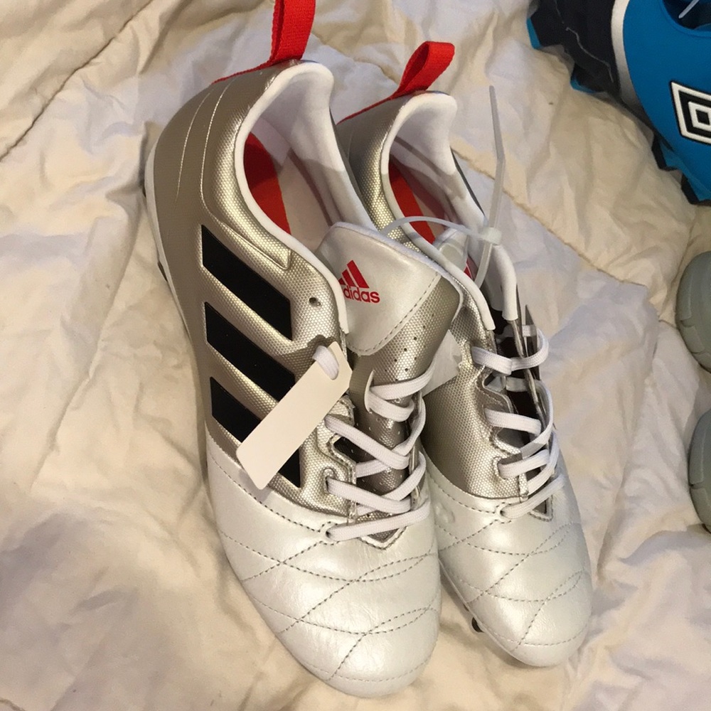 Women’s soccer cleats.  Adidas size 6.5.  NWT.